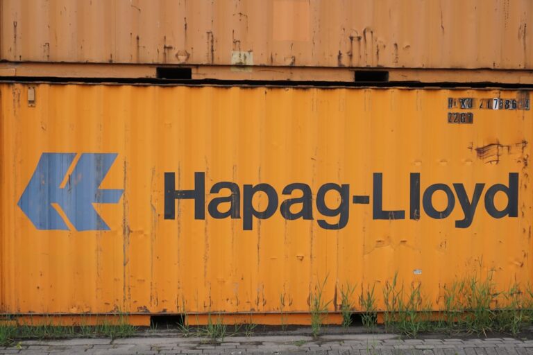 agentic commerce trust - yellow and blue steel container