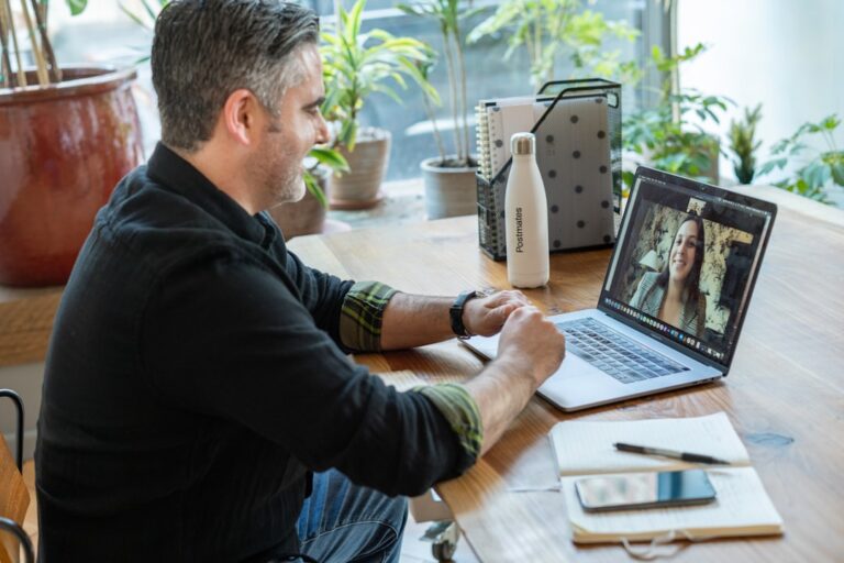video-first hiring platform - man in black sweater using macbook pro