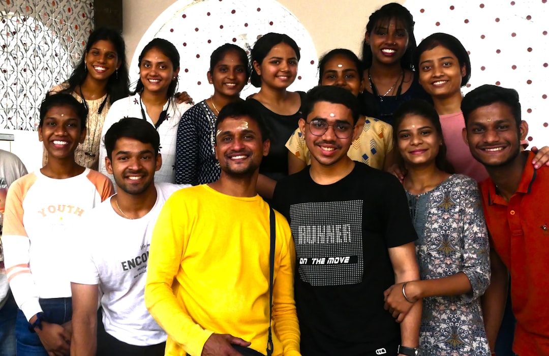 india ai unicorn - a group of people posing for a photo