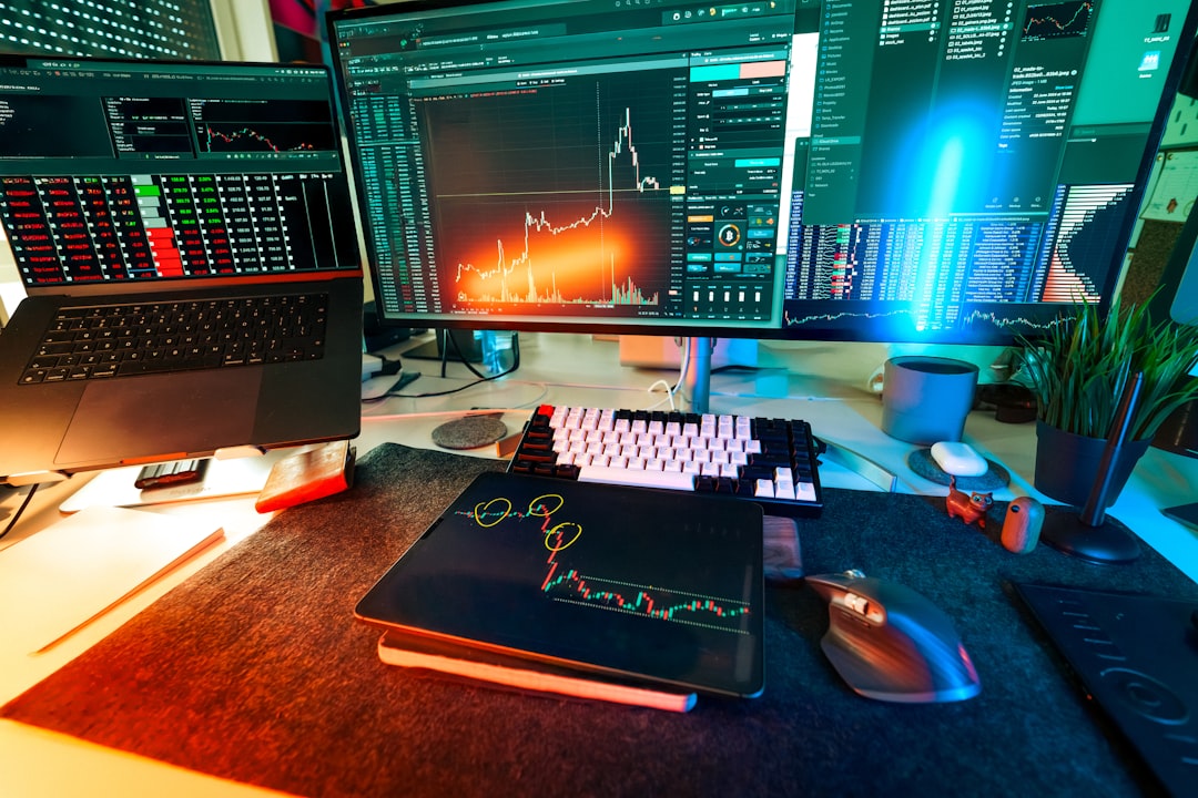 healthcare ai implementation - A trader's desk is lit up with charts.