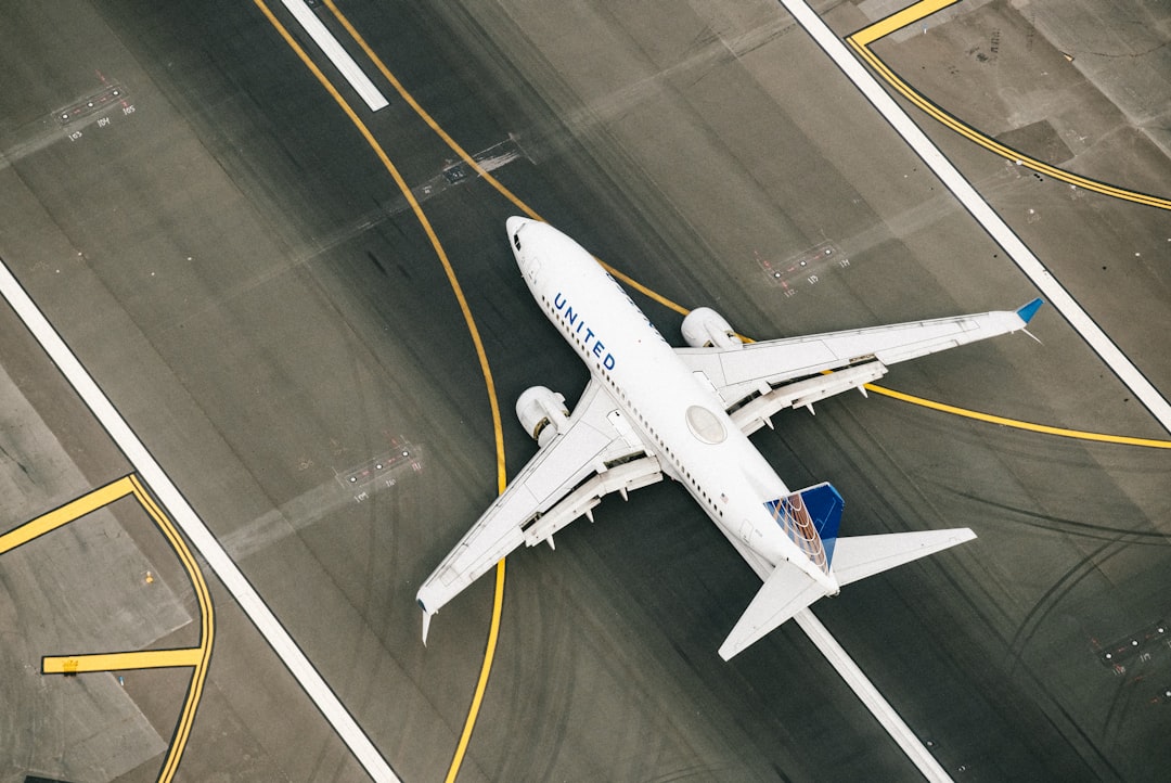 baltimore budget airline - white and blue airplane on airport during daytime