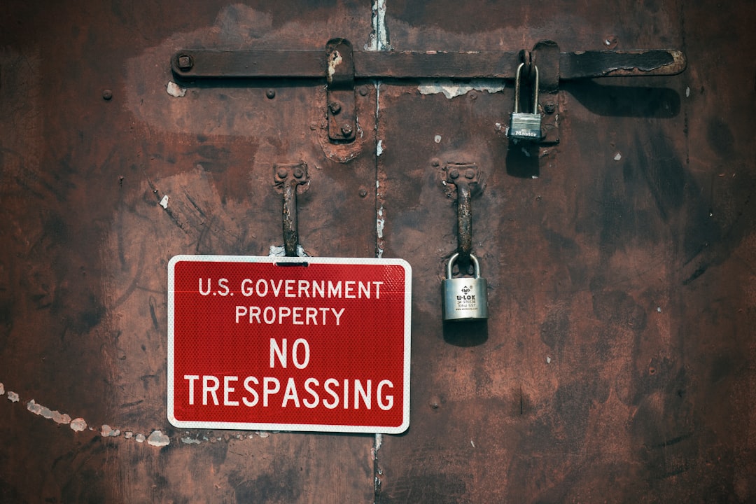 anthropic claude 5 - a no trespassing sign on a rusty door
