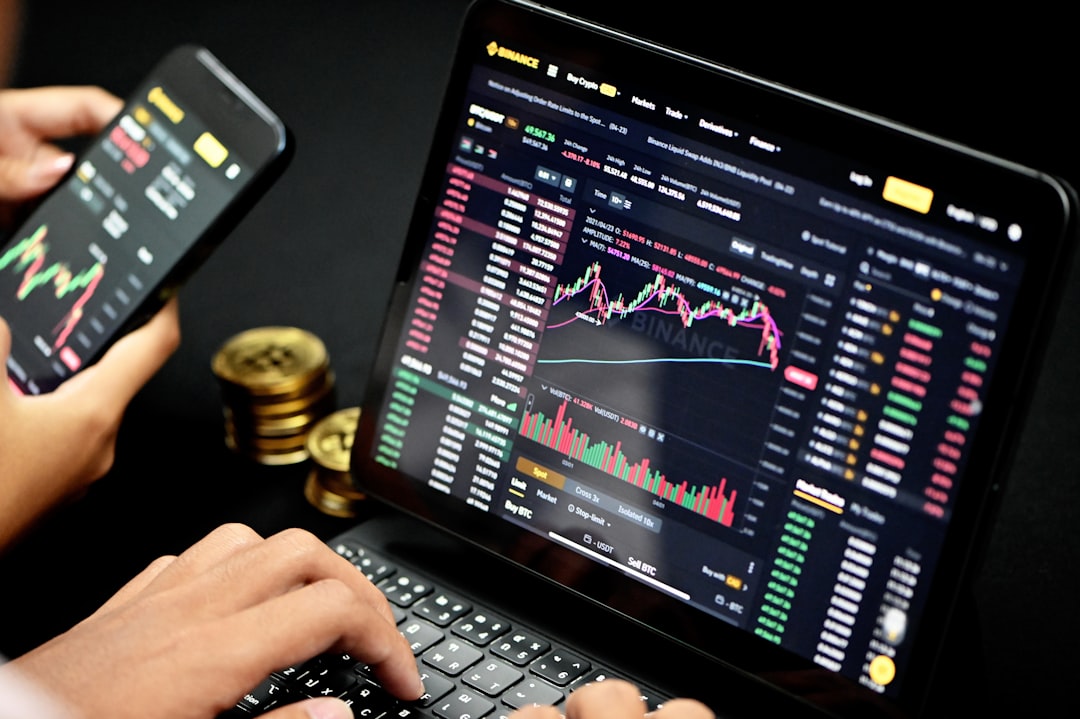 coinbase crypto fraud - person using black tablet computer