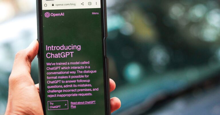 openai ipo confidential - Close-up of a smartphone showing ChatGPT details on the OpenAI website, held by a person.