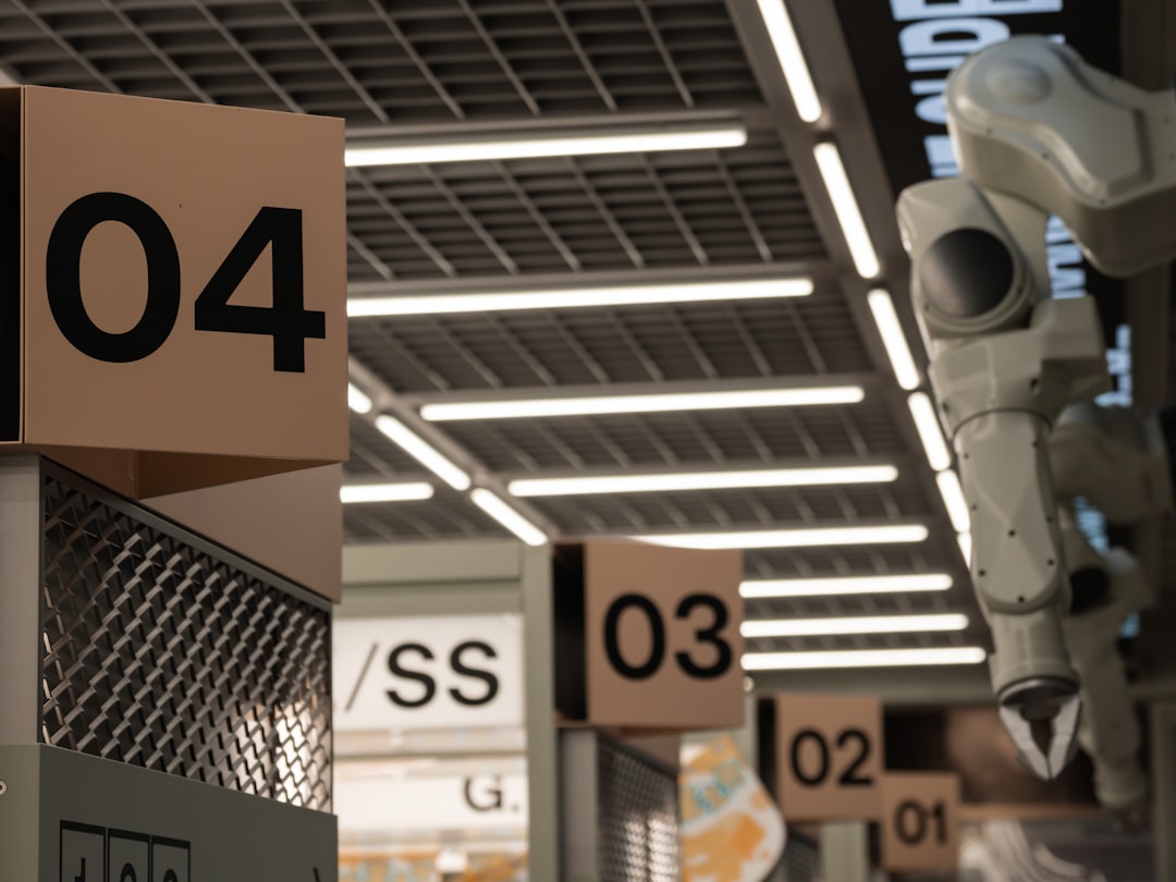 manufacturing robotics market - A number of signs in a store near a camera
