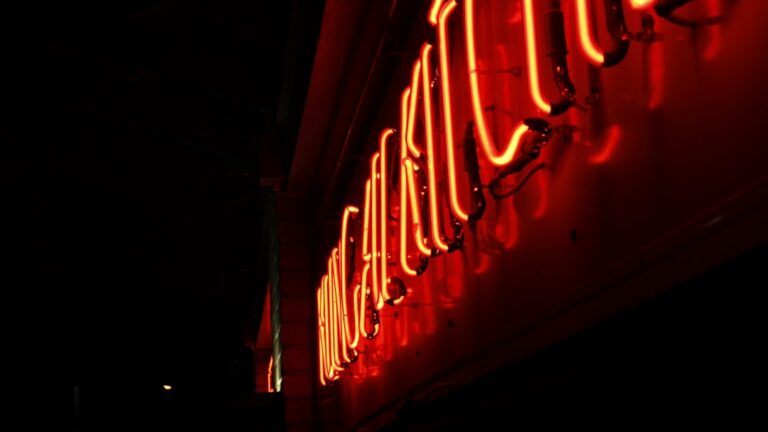 russian sanctions fine - turned-on neon signage at the dark room