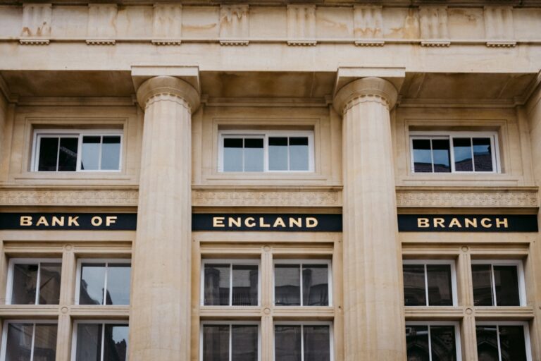 stablecoin rules eased - A bank of england building with three pillars