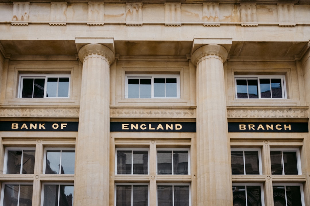 stablecoin rules eased - A bank of england building with three pillars