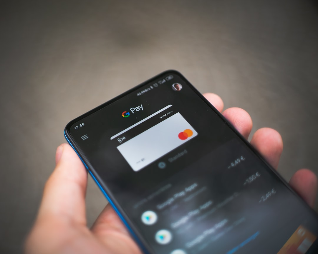 stablecoins commerce reshaping - black samsung android smartphone displaying icons