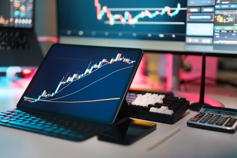 wealth management personalisation - A laptop computer sitting on top of a desk