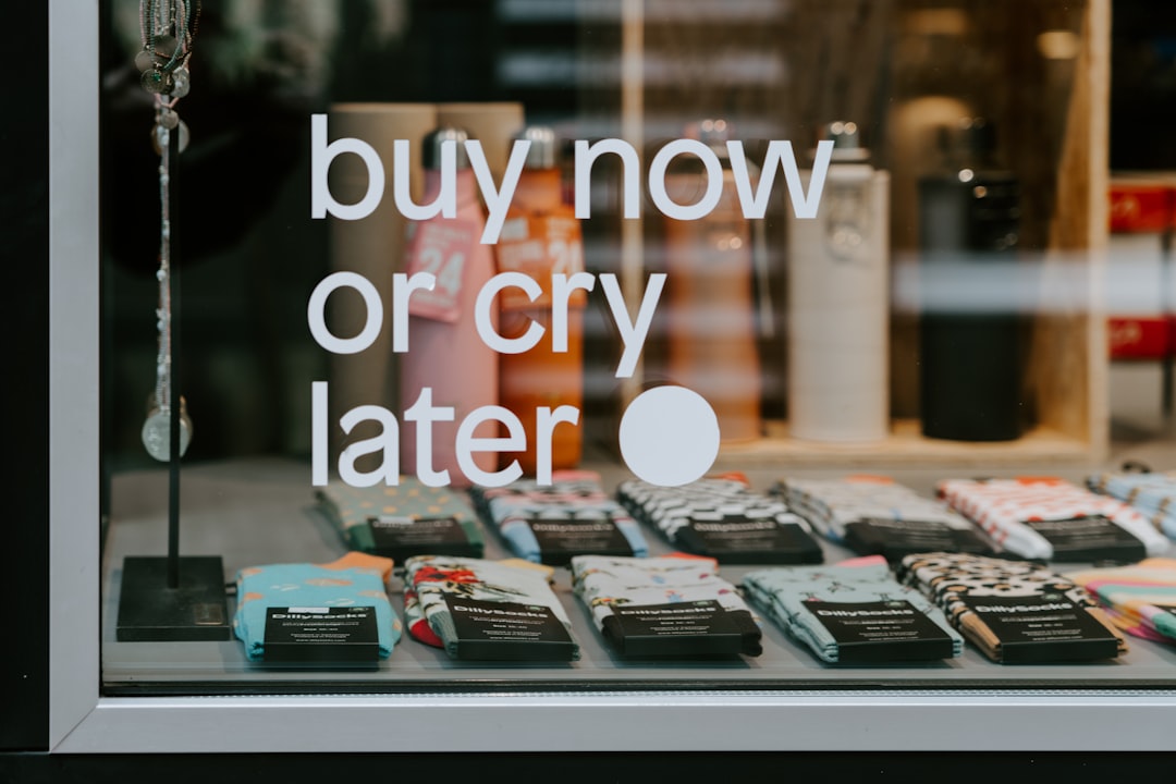 buy now pay later BNPL - assorted-color sock lot displayed behind glass window