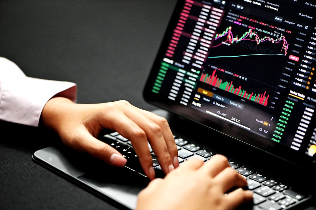 embedded finance guide - person using black laptop computer