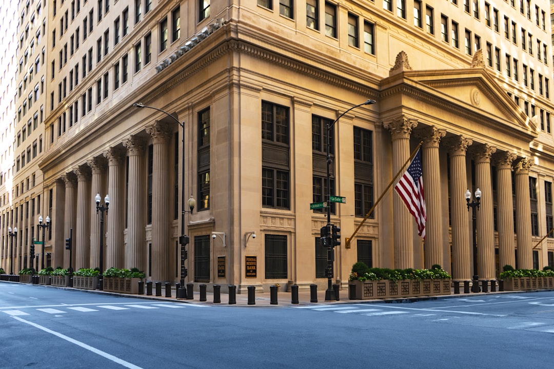 bank deregulation threat - a large building with columns and a flag on the corner