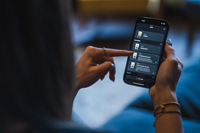ai banking impact - Woman using a smartphone with a smart home app.