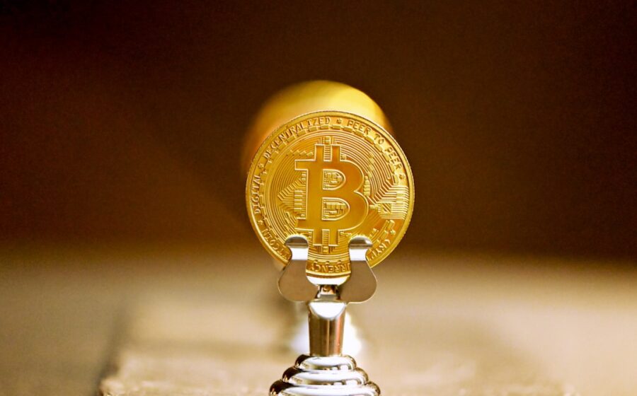 circle buys ibm blockchain - gold round ornament on white table