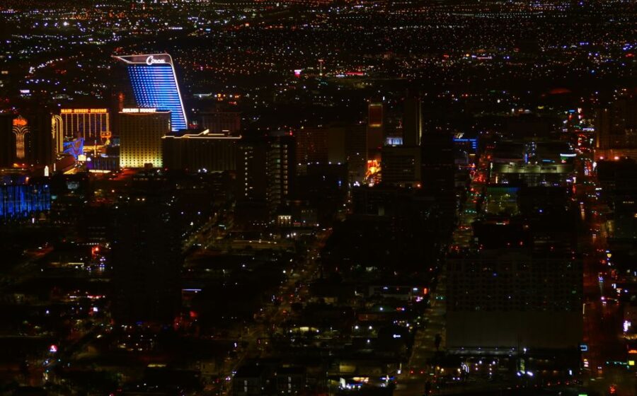 boring company funding - A captivating aerial view of Las Vegas' illuminated skyline at night, capturing its vibrant urban en