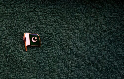 pakistan crypto dialogue - white and black plastic toy