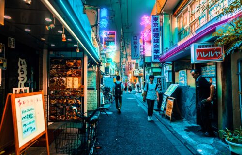 japan crypto overhaul - two person walking along the alley