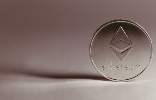 paypal stablecoin push - Close-up of a silver Ethereum coin symbolizing digital currency and blockchain technology.