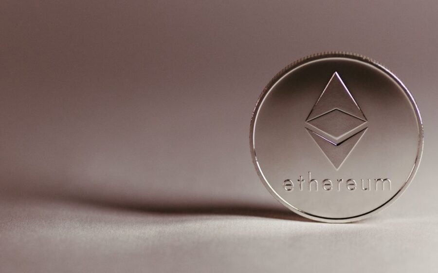 paypal stablecoin push - Close-up of a silver Ethereum coin symbolizing digital currency and blockchain technology.