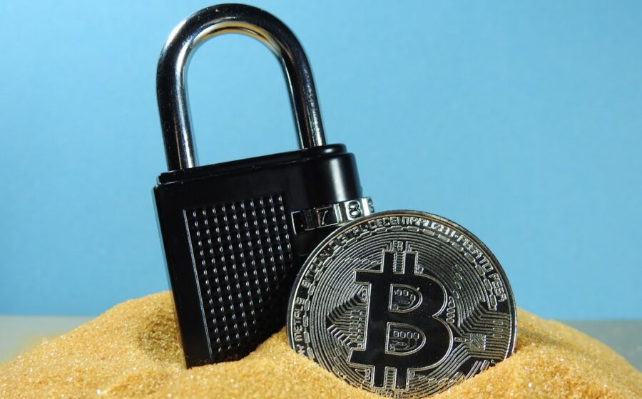 quantum-proof bitcoin - black and silver padlock on brown wooden table