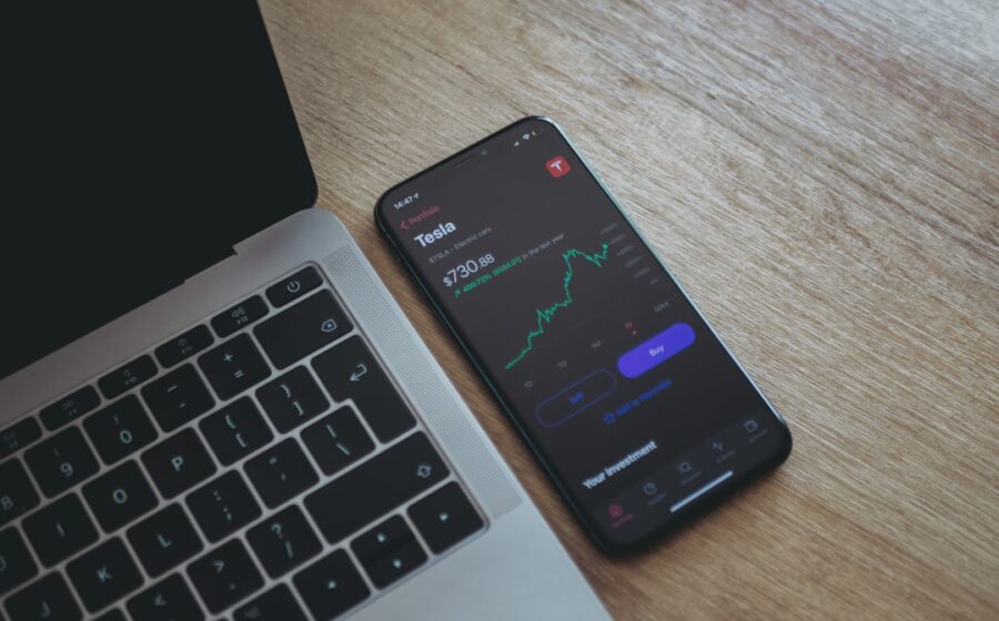 robinhood record revenue - black android smartphone on macbook pro