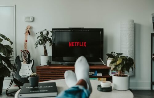 netflix viewing data - black flat screen tv turned on displaying 11