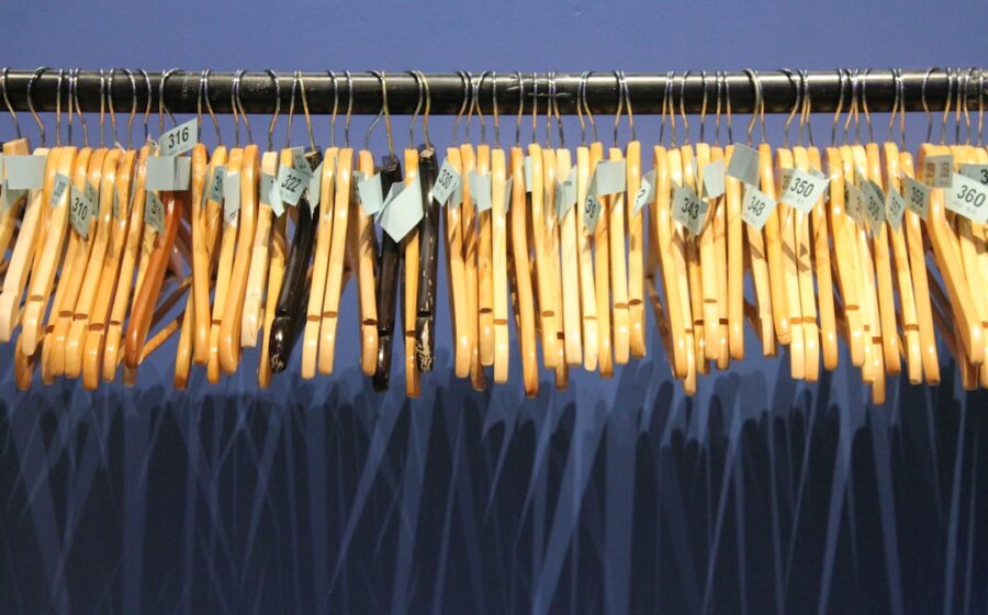 anti money laundering AML - brown wooden clothes hanger