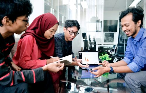 financial inclusion fintech - woman in black long sleeve shirt holding white paper