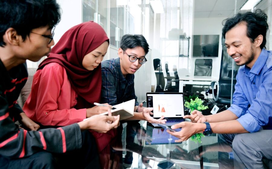 financial inclusion fintech - woman in black long sleeve shirt holding white paper