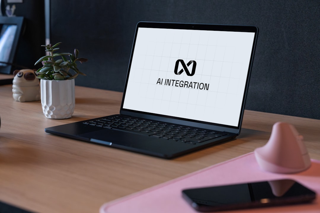 ai office alternative - Laptop displaying ai integration logo on desk