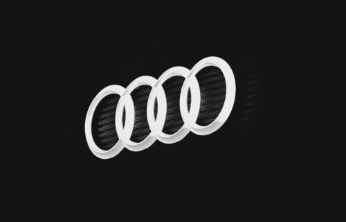 mastercard vocalink sale - Close-up of a car emblem on a dark background, showcasing minimal design.
