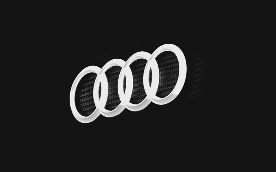 mastercard vocalink sale - Close-up of a car emblem on a dark background, showcasing minimal design.