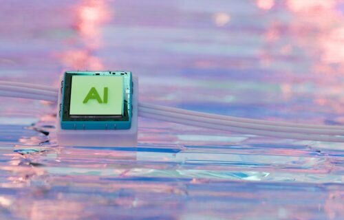 ai liability law - A square of aluminum is resting on glass.