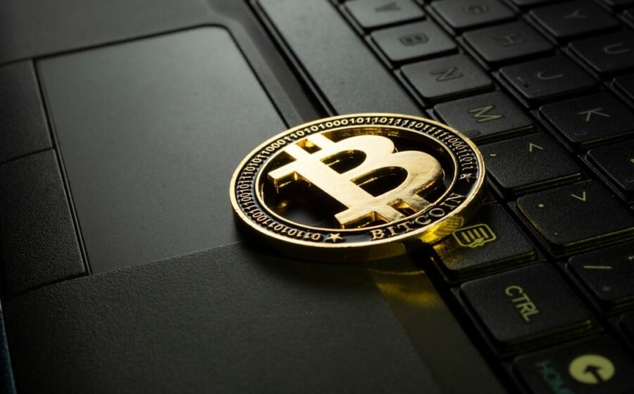 bitcoin software security - silver and black round emblem