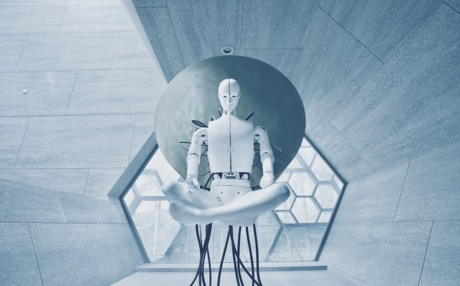 ai automation demand - man in black jacket sitting on white chair