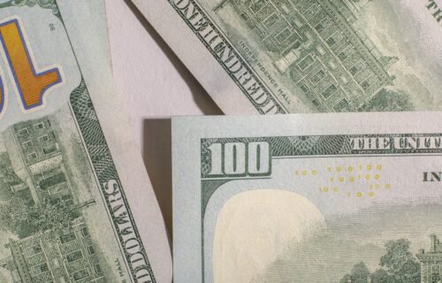 treasury buyback yields - Close-up of one hundred dollar bills
