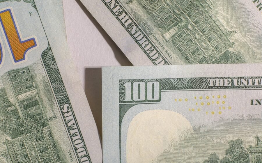 treasury buyback yields - Close-up of one hundred dollar bills