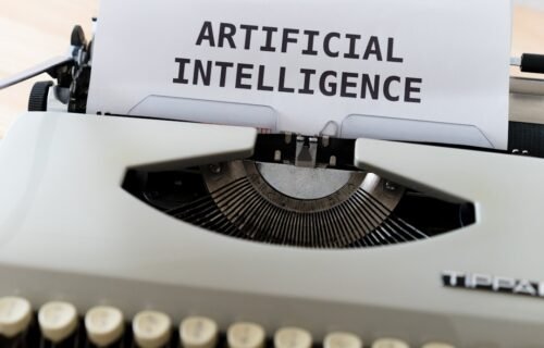 ai daily habit - white and black typewriter with white printer paper