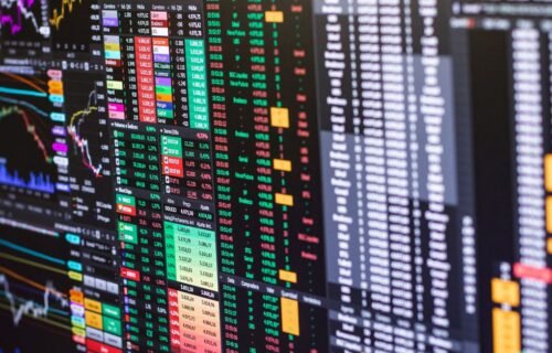blackrock tokenized fund - Detailed financial trading screen with colorful charts and data representing market fluctuations.