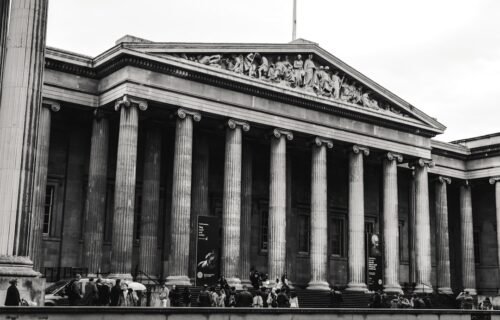 fintech payment systems - a building with columns and statues