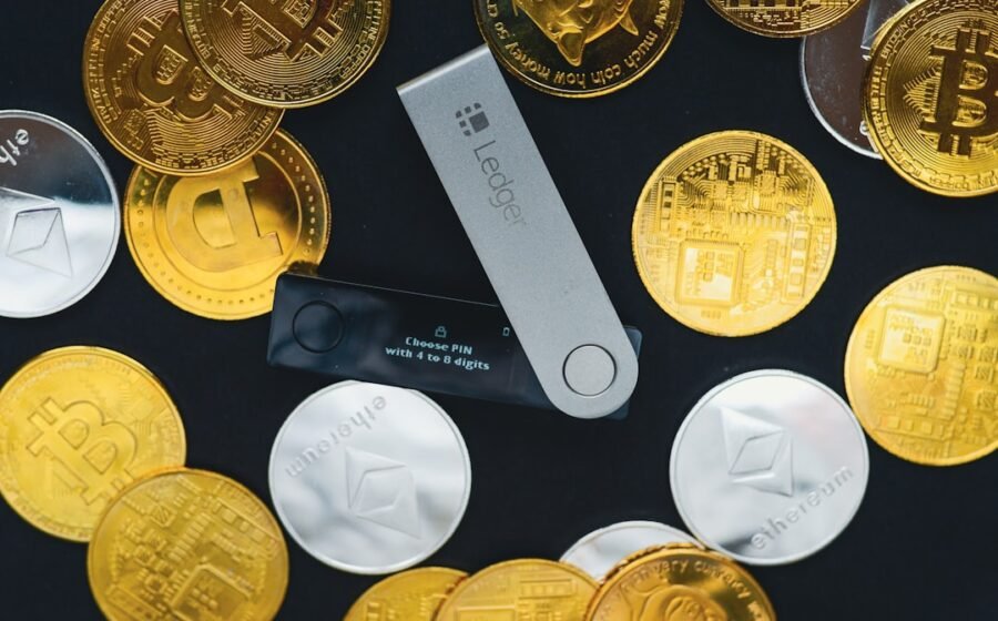coldcard bitcoin loss - a close up of a bunch of gold coins
