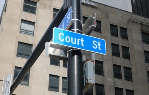 credit glory operations - A street sign indicates "court st."