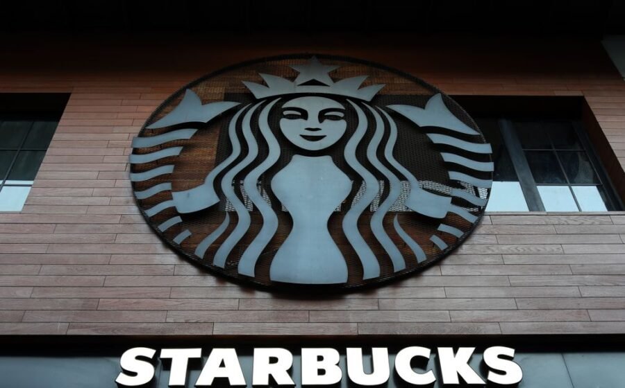 ftc settlement grubhub - Low angle shot of Starbucks building exterior with logo and windows.