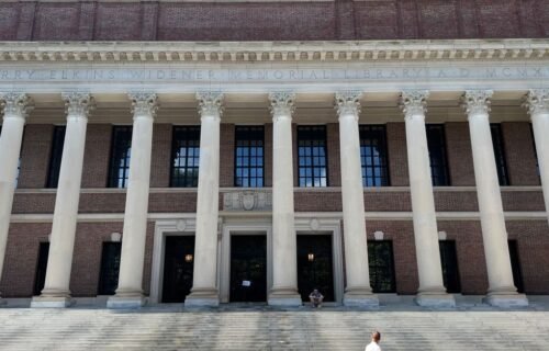 harvard ai bootcamp - Harvard University's iconic Widener Library with cyclist in front, Cambridge, MA.