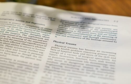 Close-up of text in a book about physical trauma