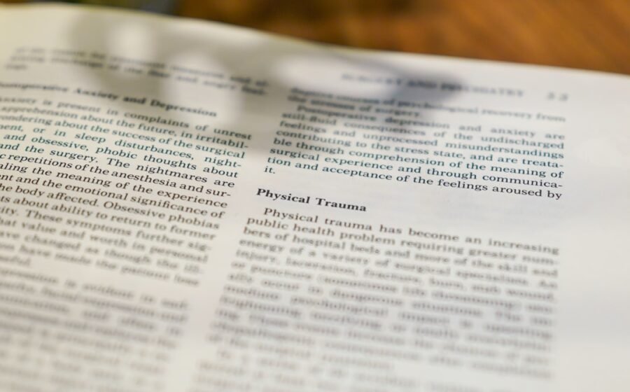 Close-up of text in a book about physical trauma