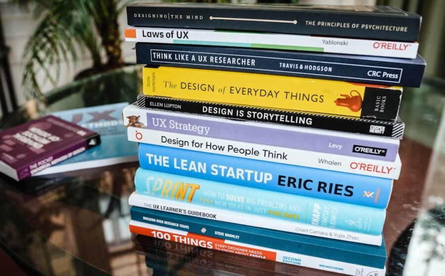startup valuation methods - stack of books on brown wooden shelf