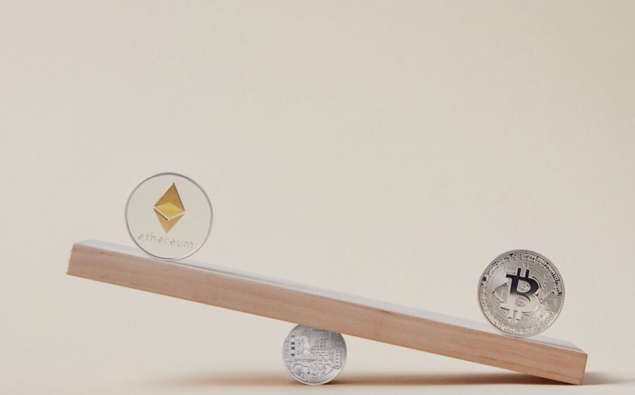 domestic stablecoins - Minimalist image of Ethereum and Bitcoin coins balancing on a plank, symbolizing crypto market dynamic
