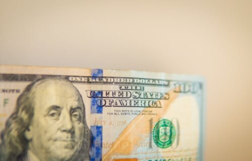 inflation eases july - Benjamin franklin on a one hundred dollar bill.